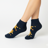 "GINGERBREAD RUN" FUZZY SOCKS